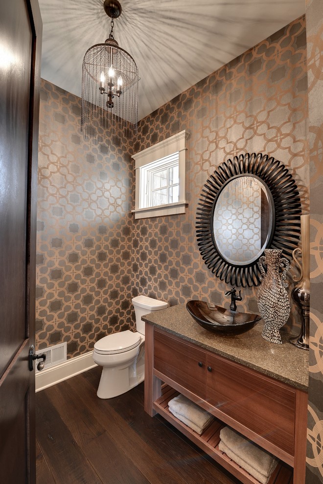 This is an example of a traditional powder room in Minneapolis with a vessel sink and grey benchtops.