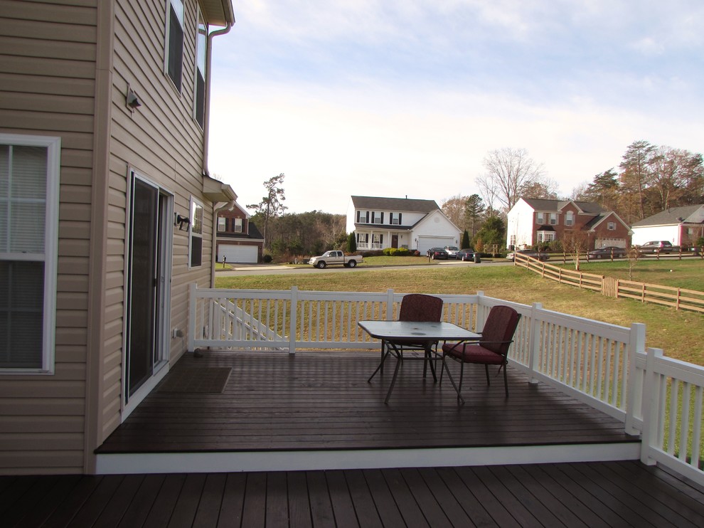 Deck - large transitional backyard deck idea with a fire pit and no cover