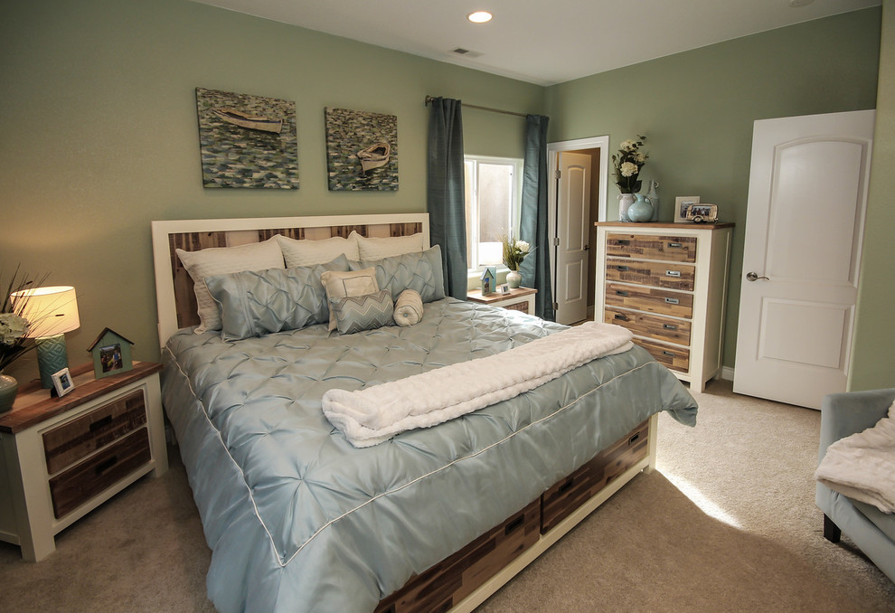 Mid-sized beach style guest bedroom in Denver with green walls and carpet.