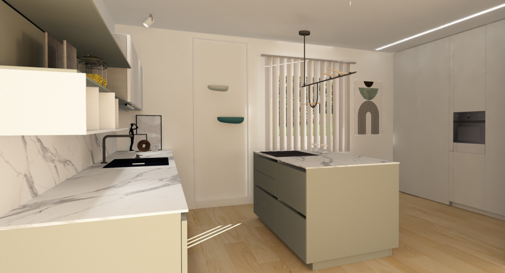 Cucina con isola centrale e colonne contenitive