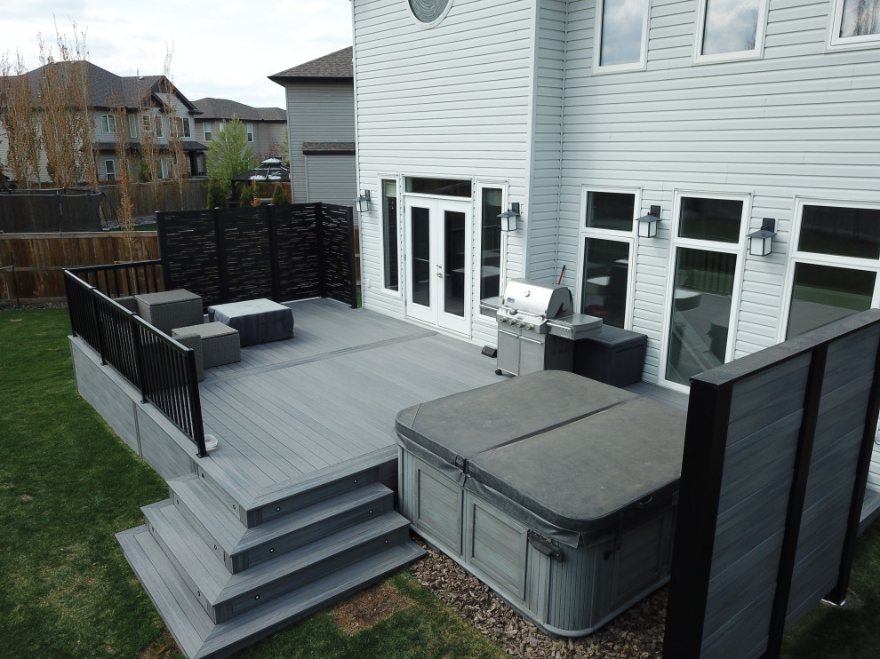 Custom Deck with Custom privacy screens, wrap around stairs and LED