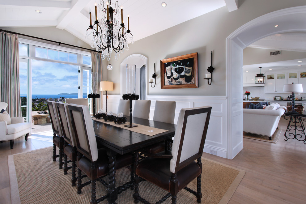 Inspiration for a traditional dining room in Orange County with grey walls, light hardwood floors and no fireplace.