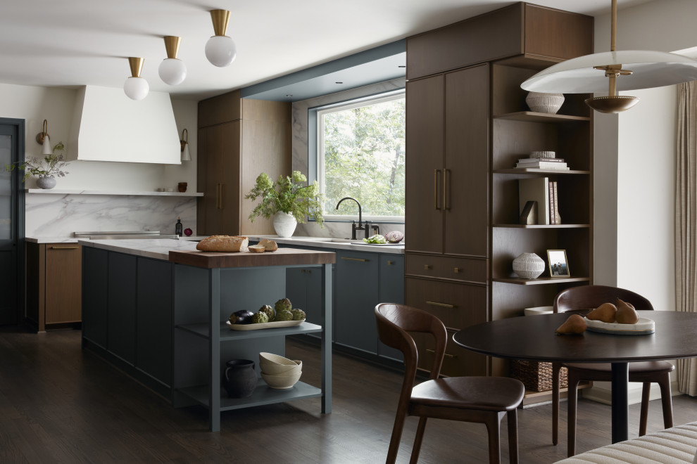 Eat-in kitchen - mid-sized transitional u-shaped dark wood floor and brown floor eat-in kitchen idea in DC Metro with a single-bowl sink, flat-panel cabinets, medium tone wood cabinets, quartz countertops, white backsplash, quartz backsplash, paneled appliances, an island and white countertops