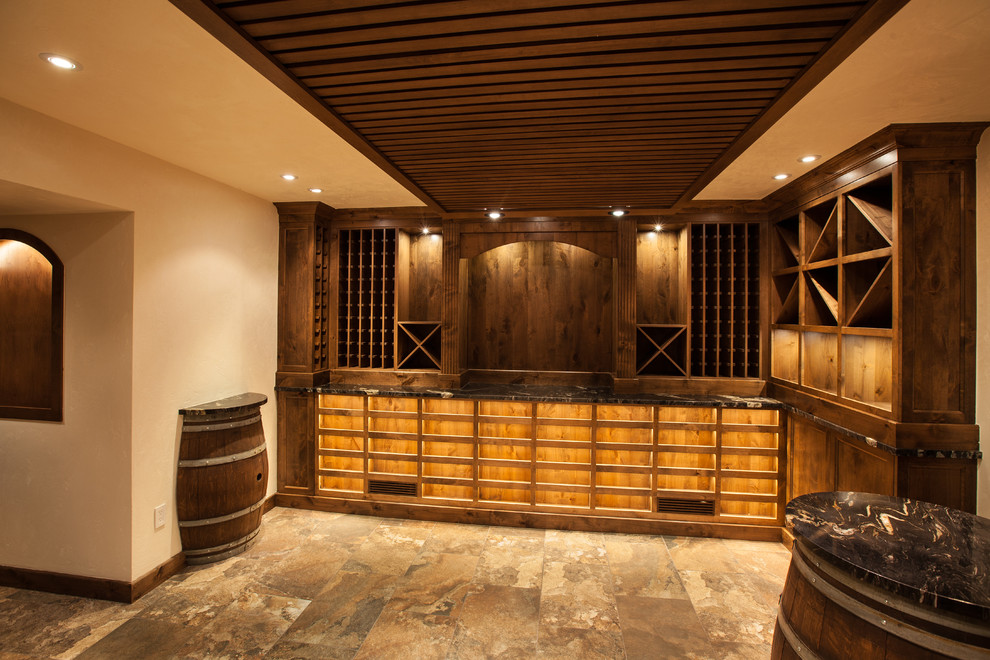 This is an example of an expansive asian wine cellar in Vancouver with storage racks.
