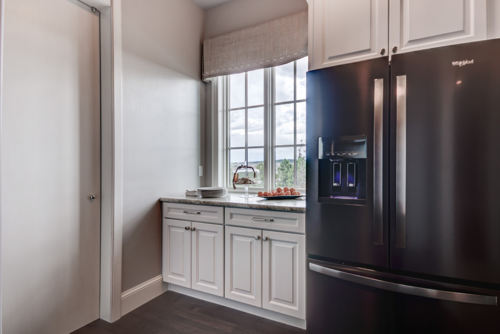 Transitional home design photo in Denver
