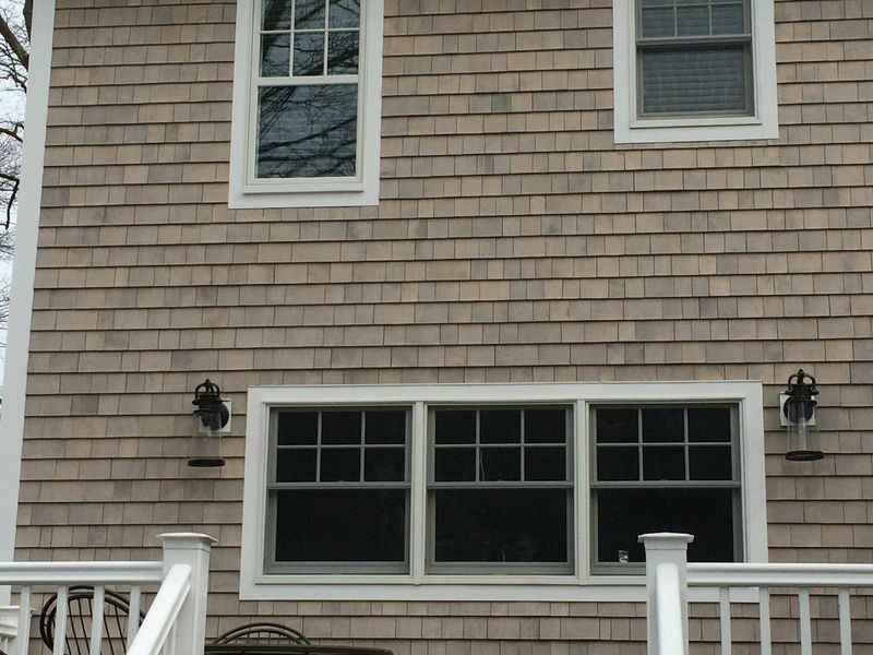 Example of a transitional exterior home design in Boston