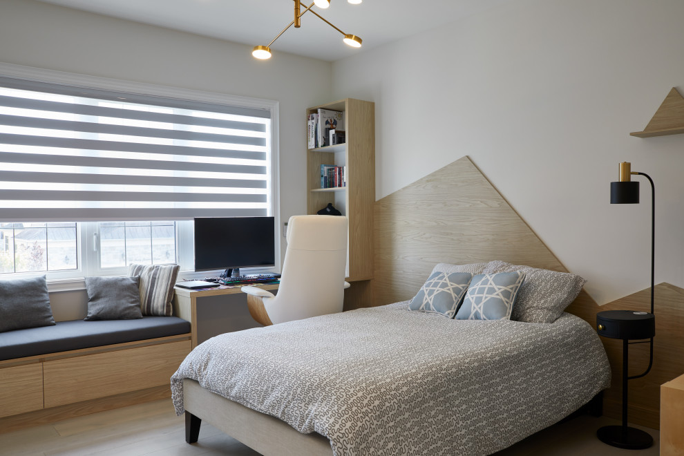 Photo of a mid-sized contemporary kids' room for boys in Toronto with white walls and wood walls.
