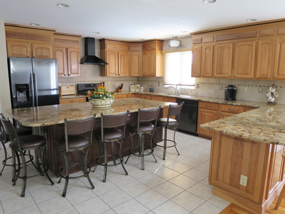 Large transitional u-shaped ceramic tile and white floor eat-in kitchen photo in Bridgeport with a double-bowl sink, raised-panel cabinets, light wood cabinets, granite countertops, white backsplash, ceramic backsplash, stainless steel appliances and an island