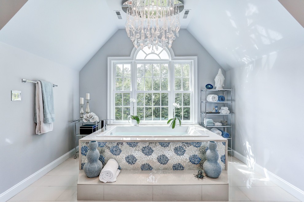 Inspiration for a large contemporary master bathroom in DC Metro with raised-panel cabinets, blue cabinets, a freestanding tub, grey walls, an undermount sink, a hinged shower door and multi-coloured benchtops.