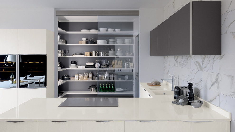 Example of a minimalist l-shaped dark wood floor eat-in kitchen design in Miami with no island