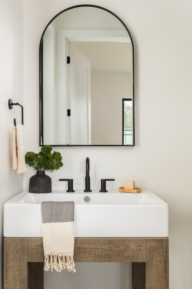 Inspiration for a transitional powder room remodel in Tampa