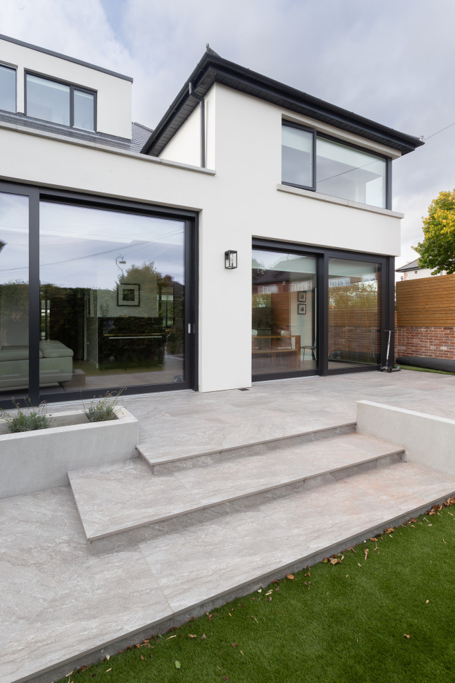 Design ideas for a modern house exterior in Dublin.