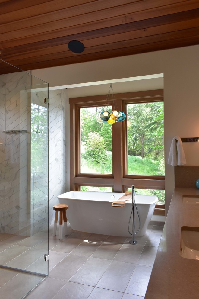 Design ideas for a midcentury bathroom in Seattle with a freestanding tub, an open shower, white walls, porcelain floors, grey floor and an open shower.