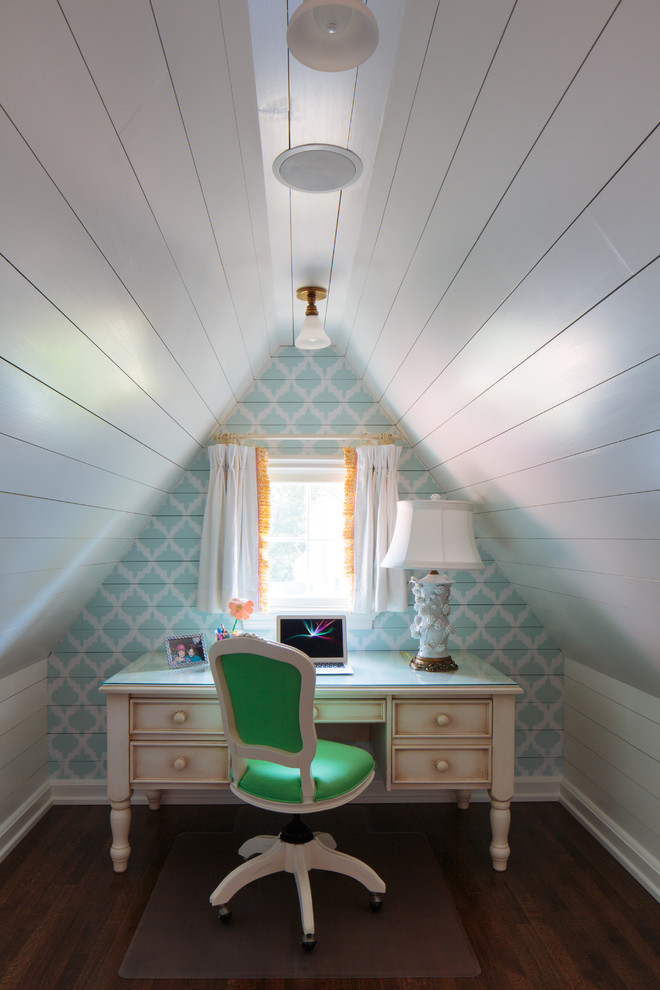 Traditional home office in Other with multi-coloured walls, dark hardwood floors and a freestanding desk.