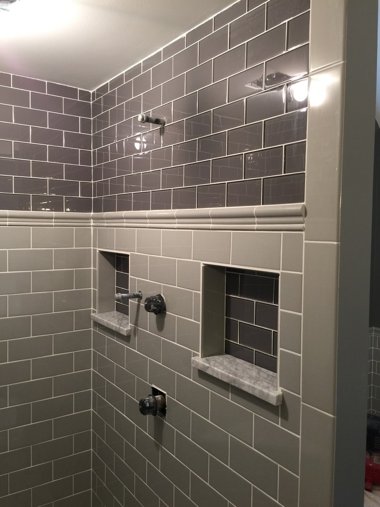 Example of a mid-sized transitional master gray tile and subway tile alcove shower design in Chicago with a vessel sink, shaker cabinets, dark wood cabinets, marble countertops and gray walls