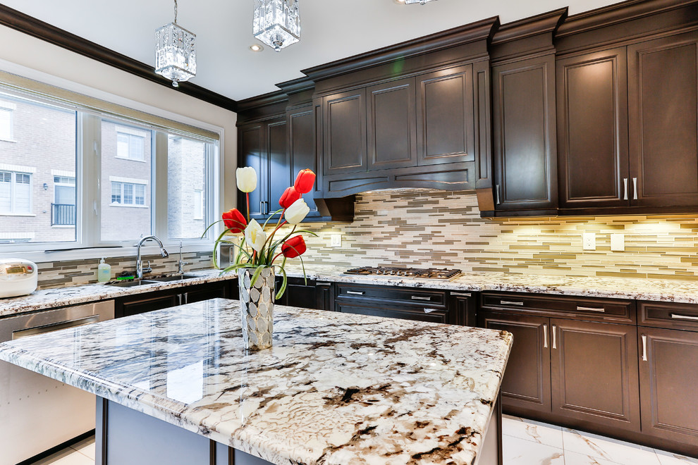 Example of a transitional kitchen design in Toronto