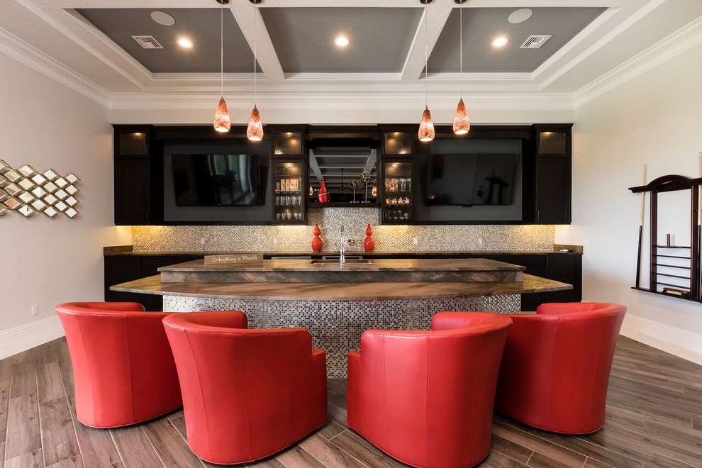 Design ideas for a transitional home bar in Orlando.