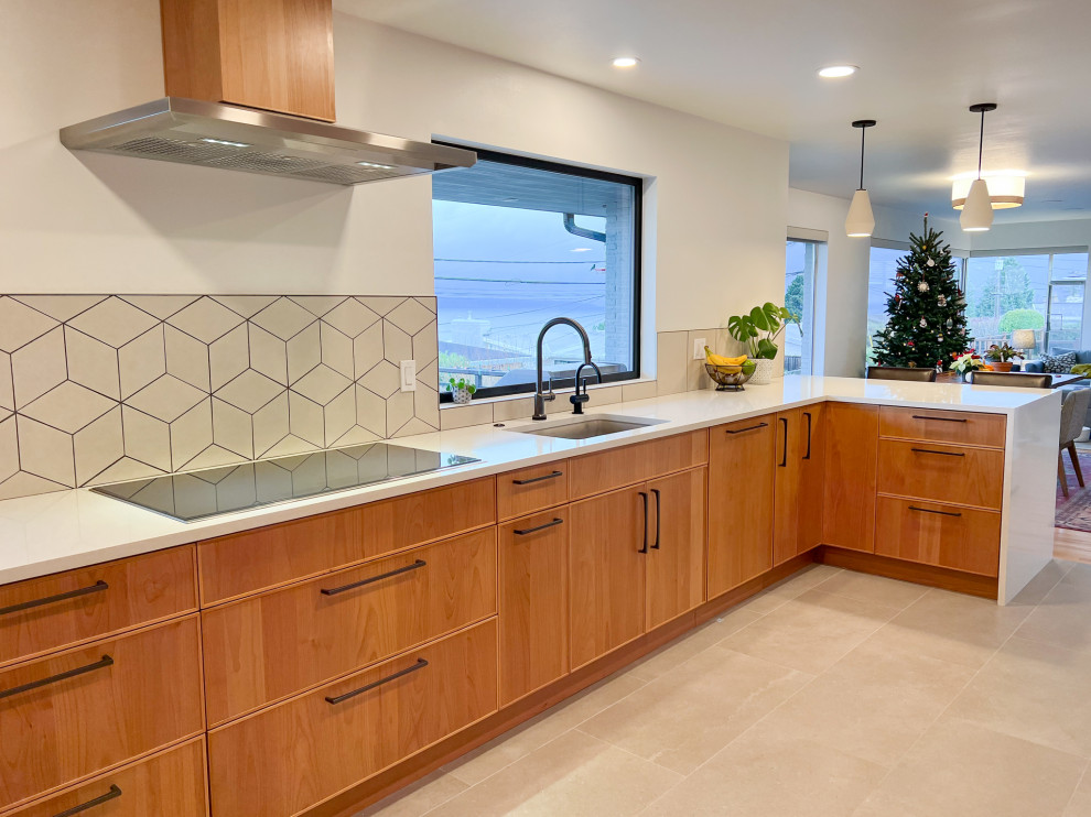 Inspiration for a large modern u-shaped open plan kitchen in Seattle with flat-panel cabinets, medium wood cabinets, quartz benchtops, a peninsula and white benchtop.