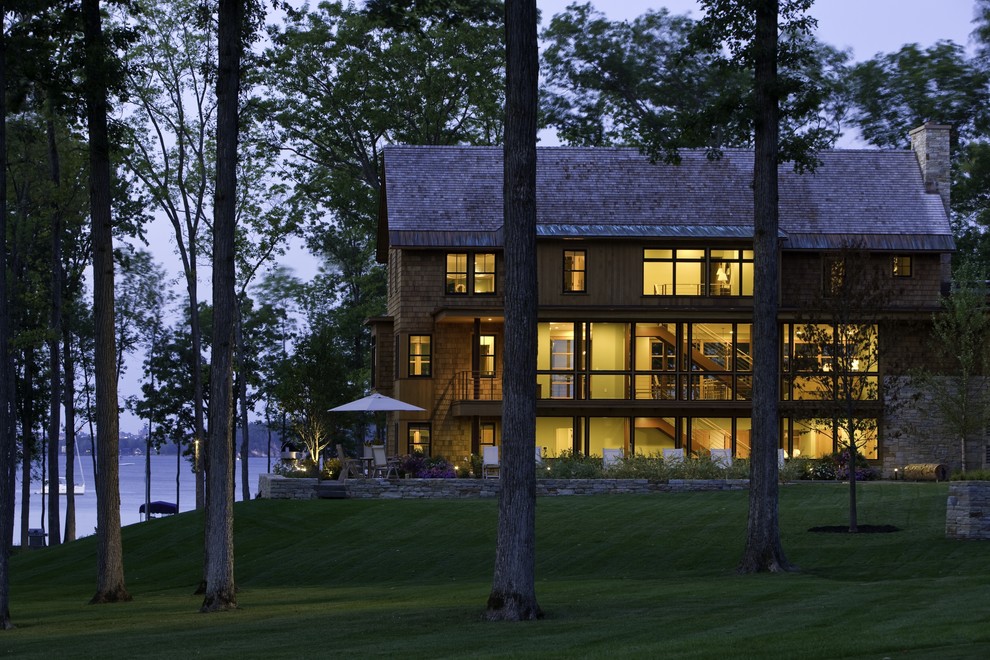This is an example of a country exterior in Burlington with wood siding.