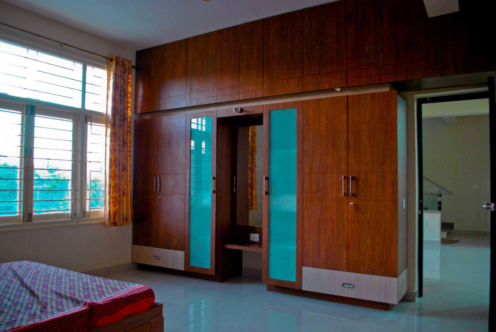 Design ideas for a bedroom in Bengaluru.