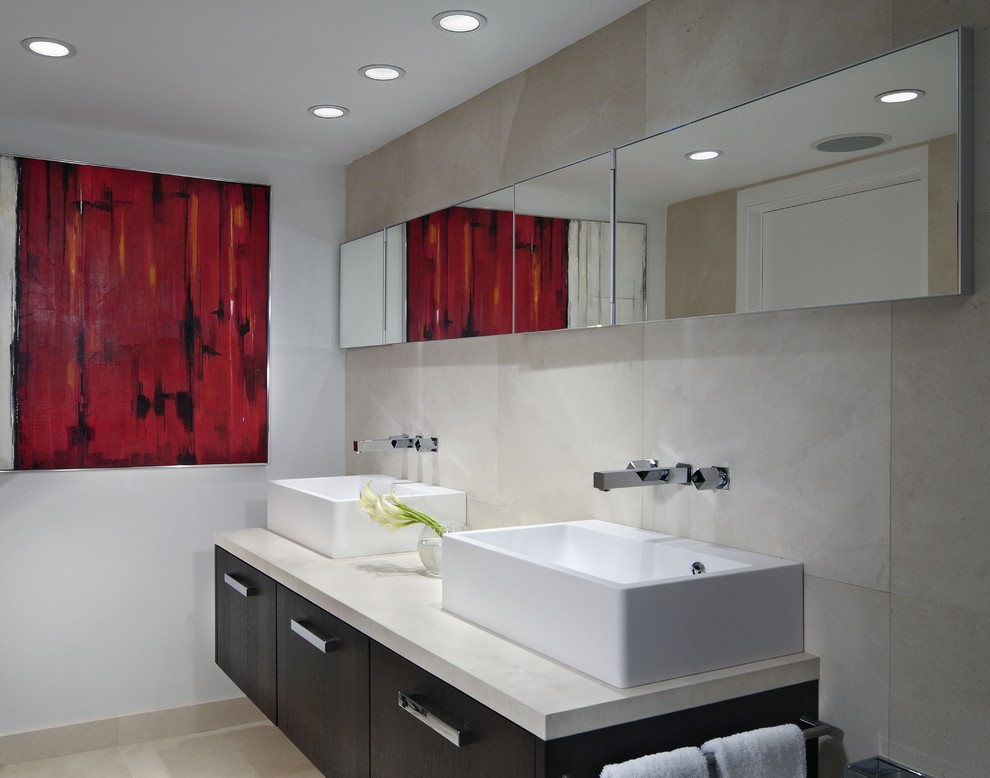 Inspiration for a mid-sized contemporary master bathroom in Miami with a vessel sink, flat-panel cabinets, dark wood cabinets, beige tile, porcelain tile, white walls, porcelain floors, engineered quartz benchtops and beige floor.