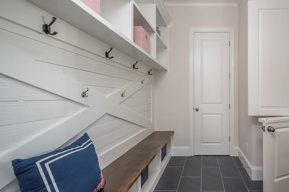 Inspiration for a mid-sized country mudroom in Raleigh with grey walls, porcelain floors, a dutch front door, a white front door and grey floor.