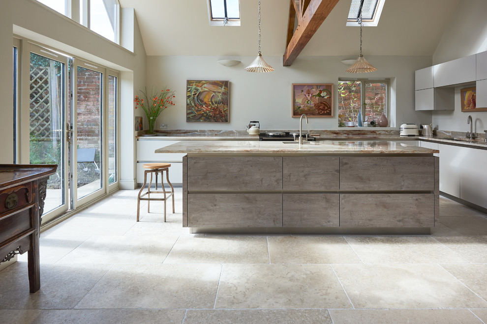 Transitional kitchen in Wiltshire with limestone floors.