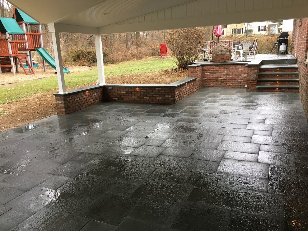 Patio with brick sitting walls and steps