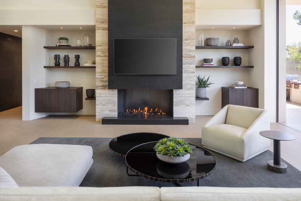 Design ideas for an expansive modern loft-style living room in Phoenix with beige walls, a ribbon fireplace, a tile fireplace surround, a wall-mounted tv and beige floor.