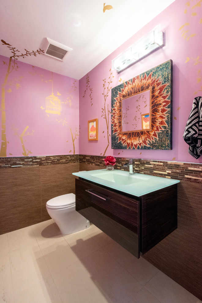 Example of a small zen brown tile ceramic tile and single-sink toilet room design in Miami with flat-panel cabinets, brown cabinets, a drop-in sink, glass countertops, green countertops and a floating vanity