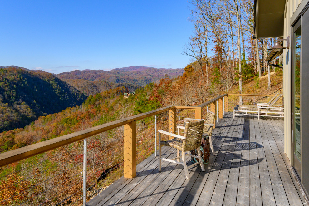 Deck - transitional backyard deck idea with no cover