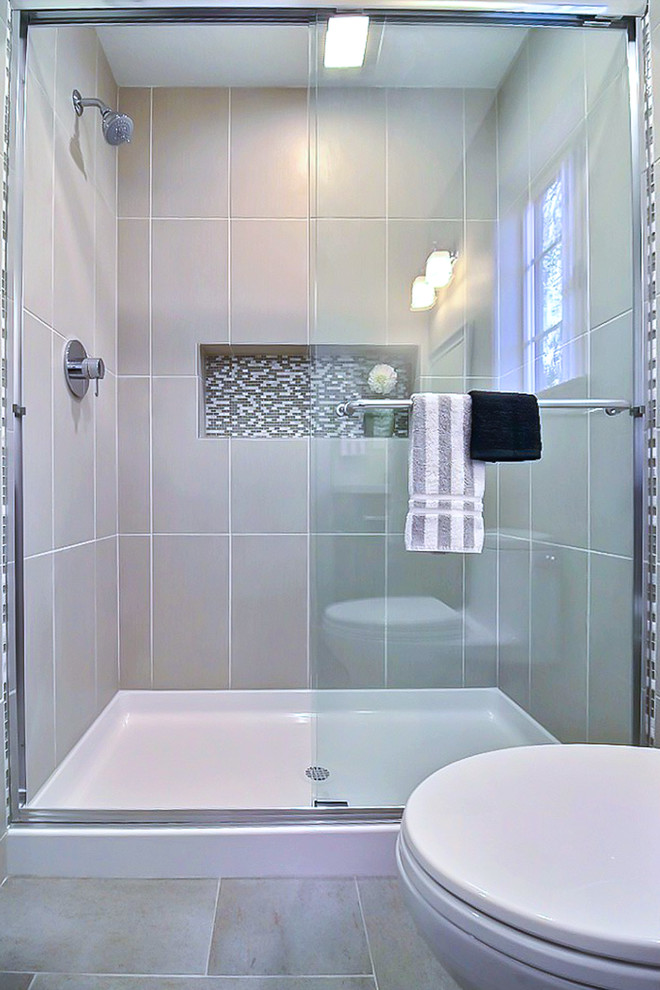 Small traditional 3/4 bathroom in San Francisco with shaker cabinets, light wood cabinets, an alcove shower, a one-piece toilet, beige tile, white tile, mosaic tile, beige walls, travertine floors, an undermount sink and solid surface benchtops.