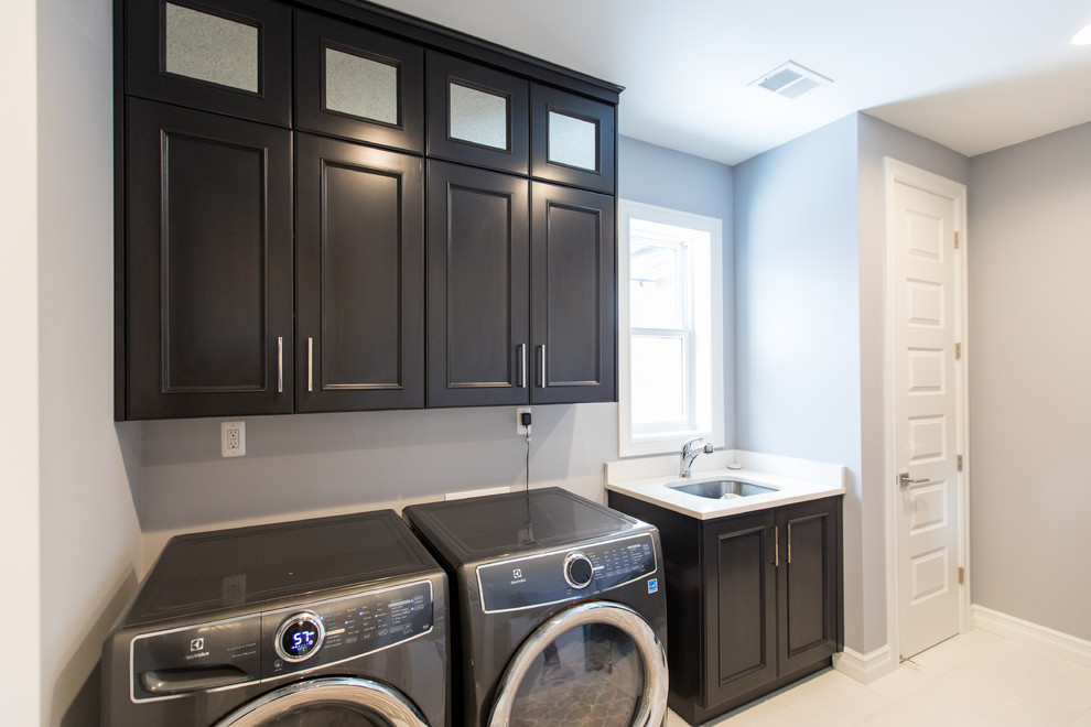 Design ideas for a transitional laundry room in Detroit.