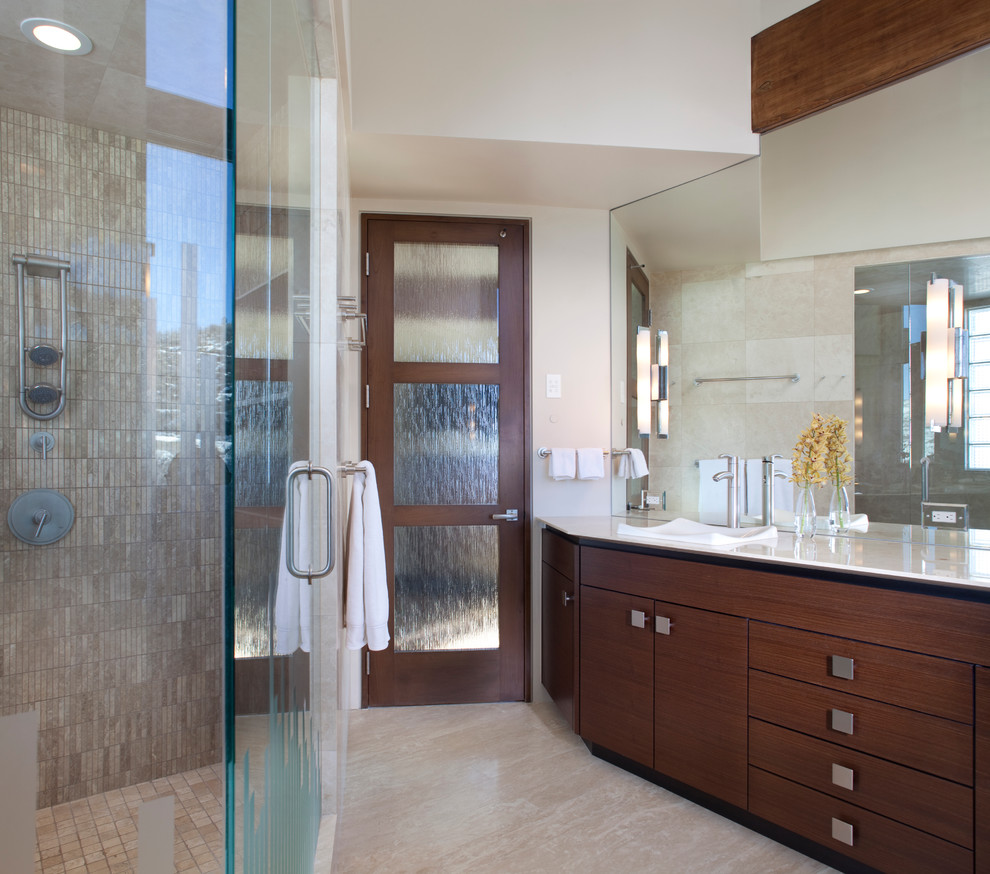 Design ideas for a large contemporary master bathroom in Denver with flat-panel cabinets, dark wood cabinets, beige tile, gray tile, solid surface benchtops, an alcove shower, matchstick tile, white walls, ceramic floors and a drop-in sink.