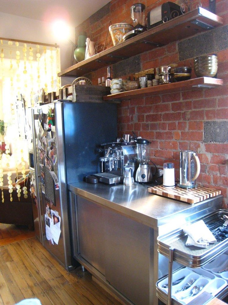 Photo of an eclectic kitchen in Melbourne.