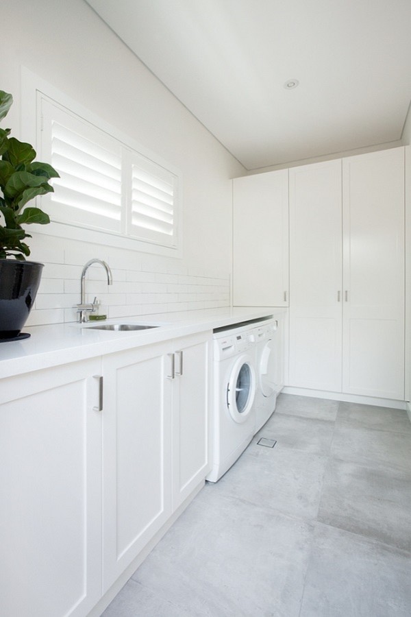 Photo of a beach style laundry room in Sydney.