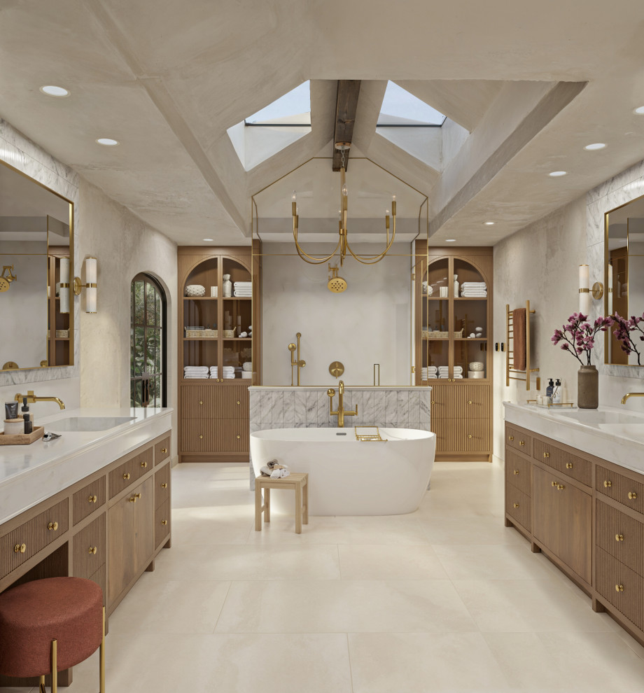 A Marble-Clad Spa Bath with Pinky’s Arched Steel Door