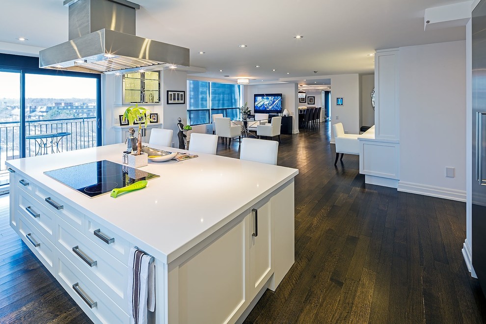 Large transitional eat-in kitchen in Toronto with recessed-panel cabinets, white cabinets and with island.