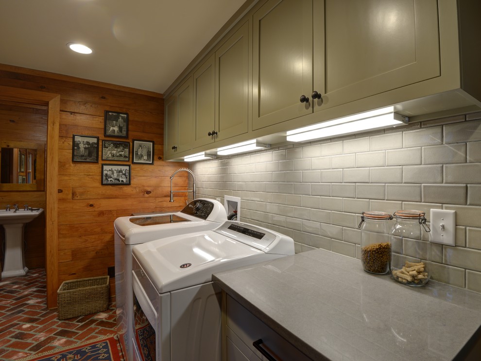 Design ideas for a mid-sized country galley utility room in Atlanta with an undermount sink, shaker cabinets, grey cabinets, quartz benchtops, brick floors, a side-by-side washer and dryer, red floor and grey benchtop.