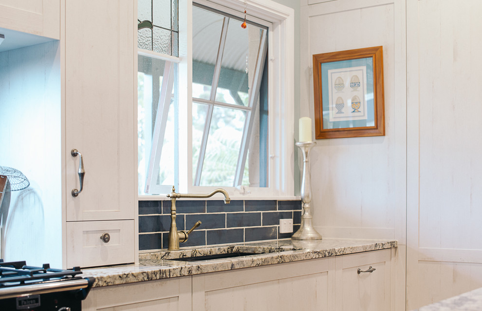 This is an example of a country kitchen in Hobart.