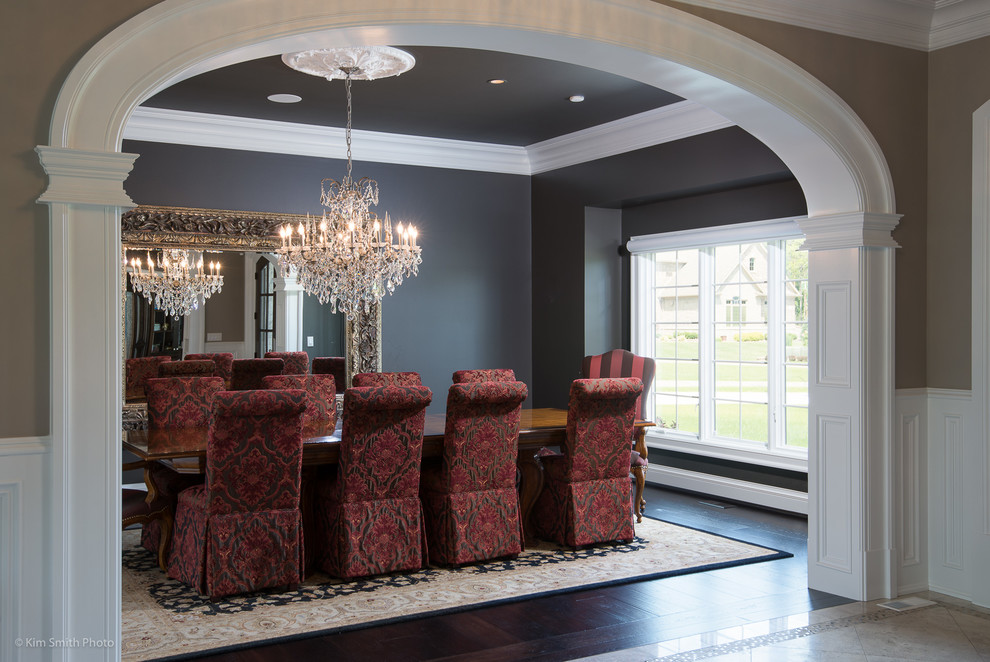 Design ideas for a large traditional separate dining room in Atlanta with grey walls and dark hardwood floors.