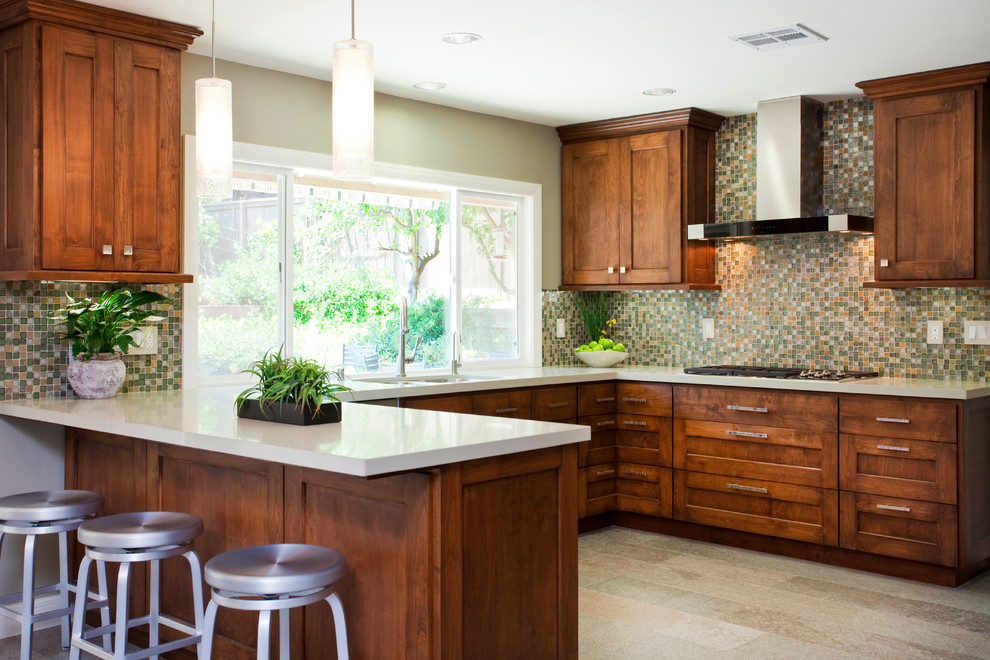 Photo of a contemporary kitchen in San Diego with mosaic tile splashback, multi-coloured splashback, shaker cabinets and dark wood cabinets.