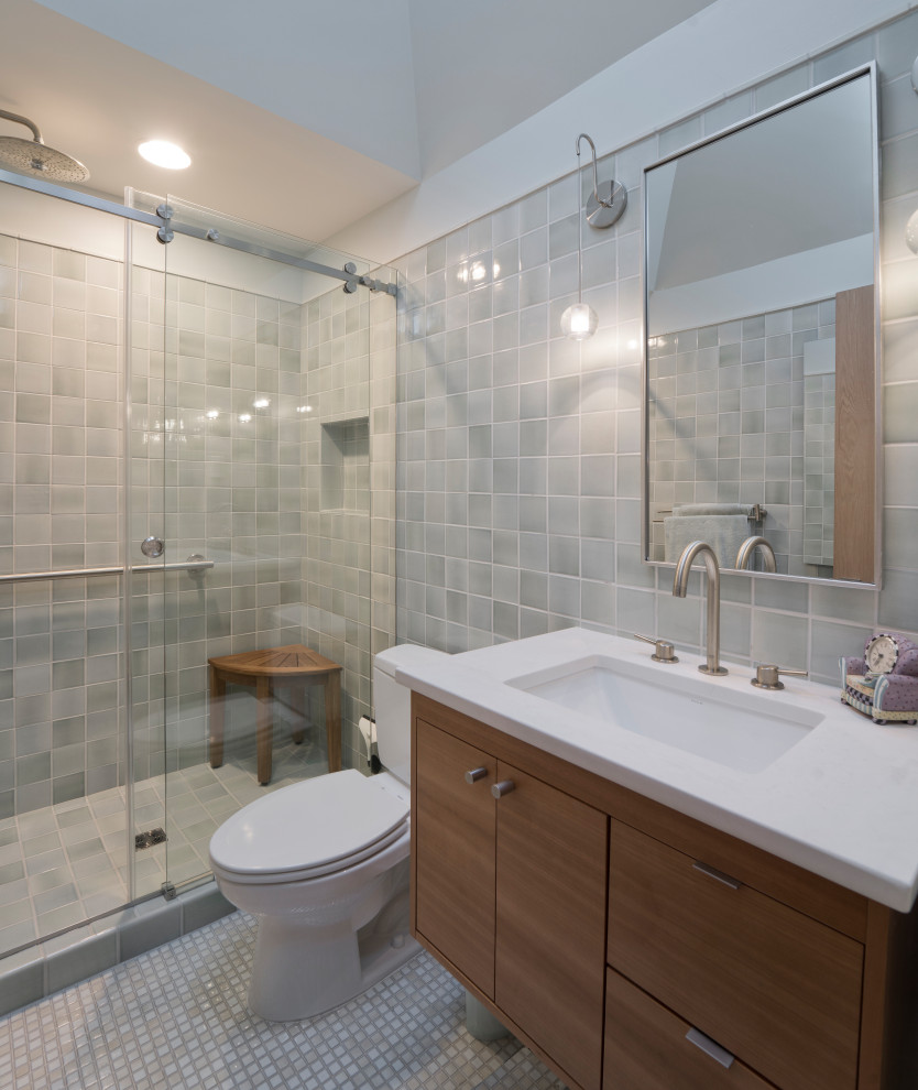 Mid-sized midcentury master bathroom in DC Metro with flat-panel cabinets, medium wood cabinets, an alcove shower, a two-piece toilet, green tile, ceramic tile, green walls, mosaic tile floors, an undermount sink, engineered quartz benchtops, white floor, a sliding shower screen, white benchtops, a niche, a single vanity, a floating vanity, vaulted and decorative wall panelling.