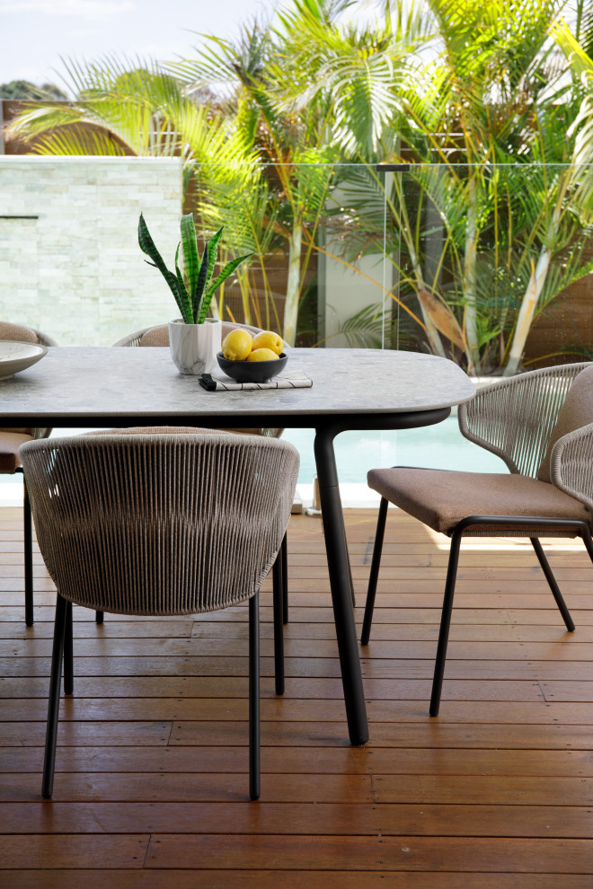 This is an example of a contemporary patio in Brisbane.