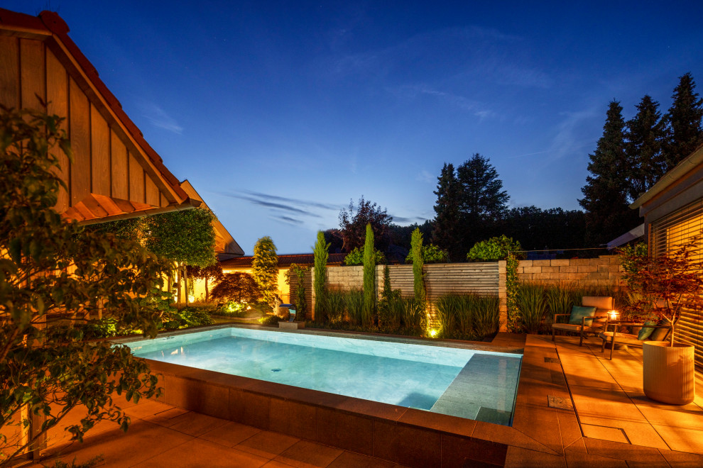 Natursteinpool als Designelement Contemporary Landscape Other