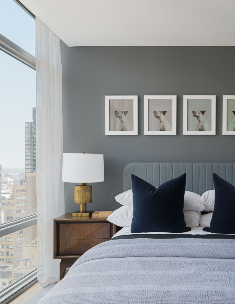 Photo of a contemporary bedroom in New York.