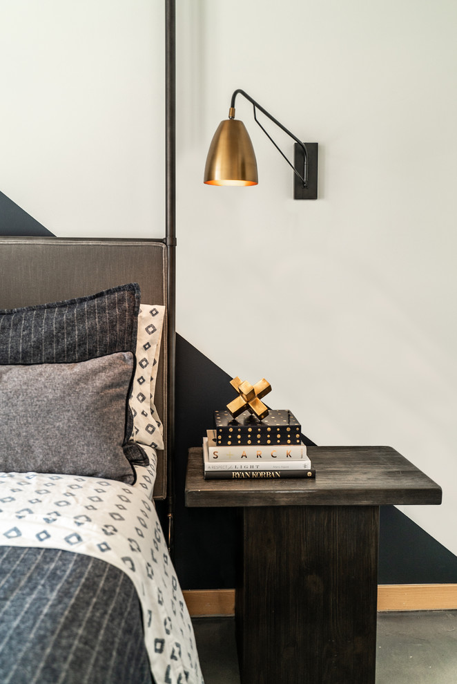 Mid-sized trendy master concrete floor and gray floor bedroom photo in Phoenix with multicolored walls and no fireplace