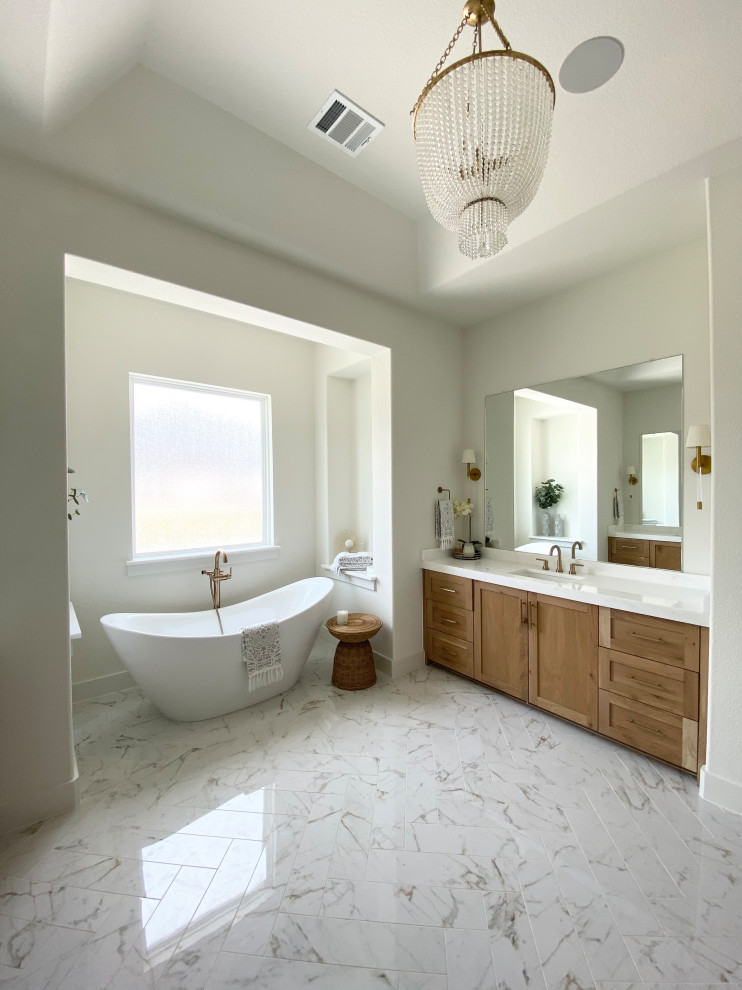 Design ideas for an expansive scandinavian master bathroom in Dallas with flat-panel cabinets, beige cabinets, a freestanding tub, an alcove shower, white tile, ceramic tile, white walls, porcelain floors, an undermount sink, engineered quartz benchtops, white floor, a hinged shower door, white benchtops, a shower seat, a single vanity and a built-in vanity.