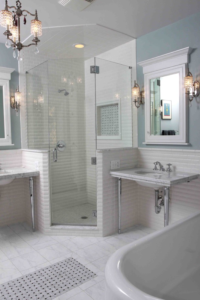 Large elegant master subway tile and white tile ceramic tile bathroom photo in Chicago with an undermount sink, marble countertops and blue walls