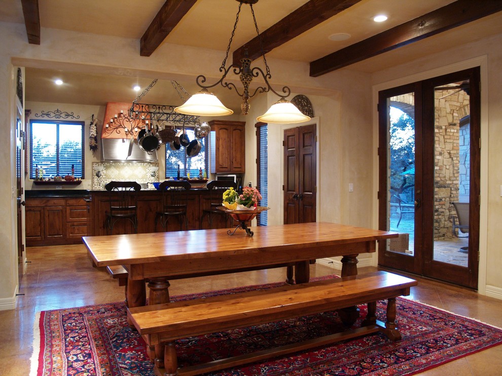 Dining room - rustic dining room idea in Austin